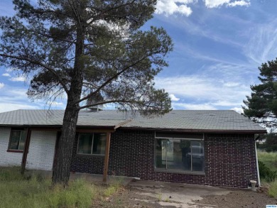 Here's an investment opportunity that could really turn out well on Silver City Golf Course in New Mexico - for sale on GolfHomes.com, golf home, golf lot