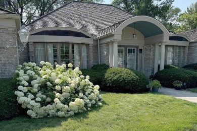 Elegant Brick Ranch Home situated on the Number Six Fairway of on Spencer Golf and Country Club in Iowa - for sale on GolfHomes.com, golf home, golf lot