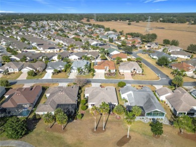 LOWEST PRICE HOME ON COUNTRY CLUB LOT.  The location is on Glenview Championship Golf and Country Club in Florida - for sale on GolfHomes.com, golf home, golf lot