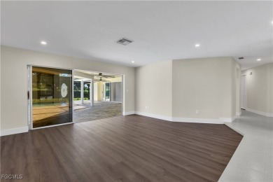 Boasting 3 bedrooms plus a den, 2.5 baths, and a 2-car garage on LaPlaya Golf Club in Florida - for sale on GolfHomes.com, golf home, golf lot