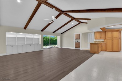 Boasting 3 bedrooms plus a den, 2.5 baths, and a 2-car garage on LaPlaya Golf Club in Florida - for sale on GolfHomes.com, golf home, golf lot