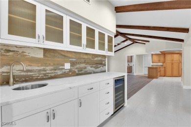 Boasting 3 bedrooms plus a den, 2.5 baths, and a 2-car garage on LaPlaya Golf Club in Florida - for sale on GolfHomes.com, golf home, golf lot