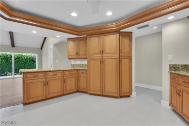 Boasting 3 bedrooms plus a den, 2.5 baths, and a 2-car garage on LaPlaya Golf Club in Florida - for sale on GolfHomes.com, golf home, golf lot