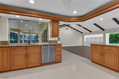 Boasting 3 bedrooms plus a den, 2.5 baths, and a 2-car garage on LaPlaya Golf Club in Florida - for sale on GolfHomes.com, golf home, golf lot