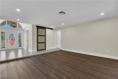 Boasting 3 bedrooms plus a den, 2.5 baths, and a 2-car garage on LaPlaya Golf Club in Florida - for sale on GolfHomes.com, golf home, golf lot