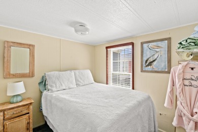 Welcome to this charming 2-bedroom retreat tucked inside the on Arcadian Shores Golf Club in South Carolina - for sale on GolfHomes.com, golf home, golf lot