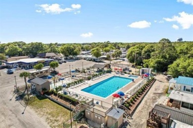 Welcome to this charming 2-bedroom retreat tucked inside the on Arcadian Shores Golf Club in South Carolina - for sale on GolfHomes.com, golf home, golf lot