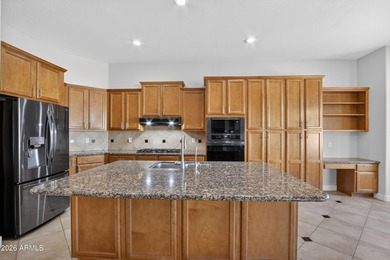 TW Lewis home in Estrella's Emerald Greens on a large lot with a on Estrella Mountain Ranch Golf Course in Arizona - for sale on GolfHomes.com, golf home, golf lot