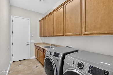 TW Lewis home in Estrella's Emerald Greens on a large lot with a on Estrella Mountain Ranch Golf Course in Arizona - for sale on GolfHomes.com, golf home, golf lot