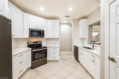 Tucked at the end of a quiet cul-de-sac in the highly desirable on West Bay Beach and Golf Club in Florida - for sale on GolfHomes.com, golf home, golf lot