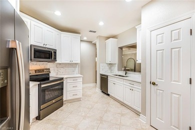 Tucked at the end of a quiet cul-de-sac in the highly desirable on West Bay Beach and Golf Club in Florida - for sale on GolfHomes.com, golf home, golf lot