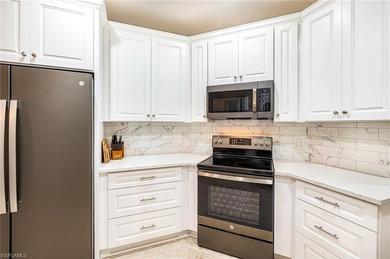 Tucked at the end of a quiet cul-de-sac in the highly desirable on West Bay Beach and Golf Club in Florida - for sale on GolfHomes.com, golf home, golf lot