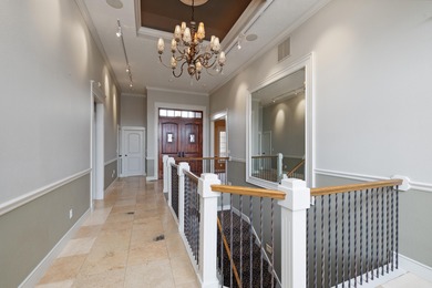 This 4 bed, 3.5 bath home is located in the San Poppi on Millwood Golf and Racquet Club in Missouri - for sale on GolfHomes.com, golf home, golf lot