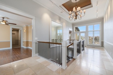 This 4 bed, 3.5 bath home is located in the San Poppi on Millwood Golf and Racquet Club in Missouri - for sale on GolfHomes.com, golf home, golf lot