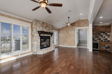 This 4 bed, 3.5 bath home is located in the San Poppi on Millwood Golf and Racquet Club in Missouri - for sale on GolfHomes.com, golf home, golf lot