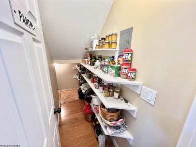 Experience single-level, luxury living at the recently renovated on Mountain View Golf Course in West Virginia - for sale on GolfHomes.com, golf home, golf lot
