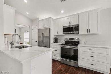 If you are seeking a perfect, TURNKEY property in Southwest on Colonial Country Club in Florida - for sale on GolfHomes.com, golf home, golf lot