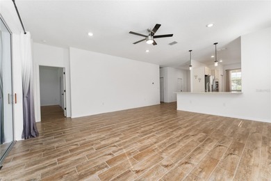 Rare Indigo East Aster Model with Fenced-in Back Yard! This on On Top of the World Golf Course in Florida - for sale on GolfHomes.com, golf home, golf lot