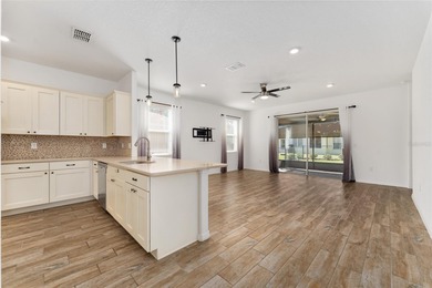 Rare Indigo East Aster Model with Fenced-in Back Yard! This on On Top of the World Golf Course in Florida - for sale on GolfHomes.com, golf home, golf lot