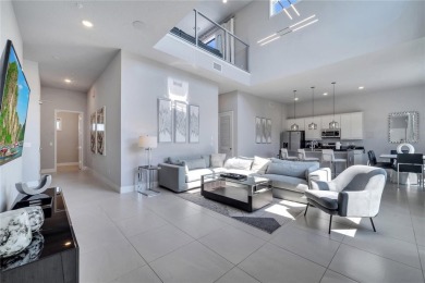 Discover luxury living in this upgraded, fully furnished modern on Reunion Resort Golf Course in Florida - for sale on GolfHomes.com, golf home, golf lot