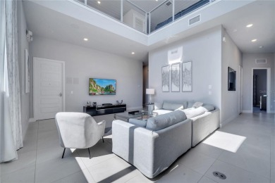 Discover luxury living in this upgraded, fully furnished modern on Reunion Resort Golf Course in Florida - for sale on GolfHomes.com, golf home, golf lot