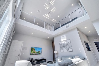Discover luxury living in this upgraded, fully furnished modern on Reunion Resort Golf Course in Florida - for sale on GolfHomes.com, golf home, golf lot