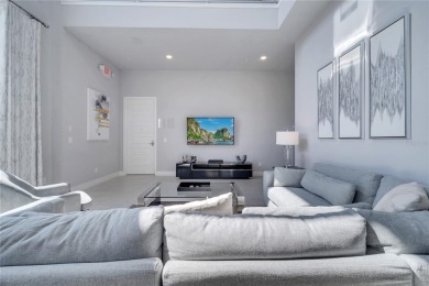Discover luxury living in this upgraded, fully furnished modern on Reunion Resort Golf Course in Florida - for sale on GolfHomes.com, golf home, golf lot