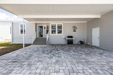 Welcome to your dream home in the prestigious Six Lakes Country on Six Lakes Country Club in Florida - for sale on GolfHomes.com, golf home, golf lot