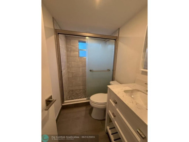 Experience the best of Pine Island Ridge in this spacious on Pine Island Ridge Country Club in Florida - for sale on GolfHomes.com, golf home, golf lot