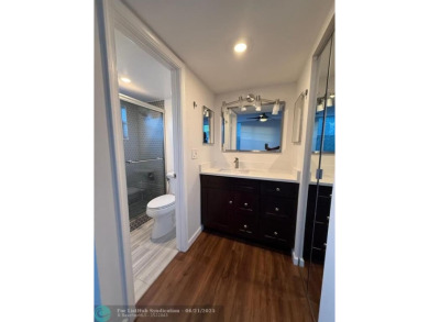 Experience the best of Pine Island Ridge in this spacious on Pine Island Ridge Country Club in Florida - for sale on GolfHomes.com, golf home, golf lot