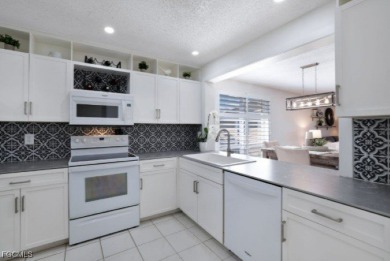Highly Sought After 2nd Floor Corner End Unit with large side on Imperial Golf Club in Florida - for sale on GolfHomes.com, golf home, golf lot