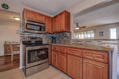 Welcome To This Charming 2 Bedroom 2 Bath Single-Family Home In on Mainlands Golf Club in Florida - for sale on GolfHomes.com, golf home, golf lot
