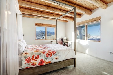 Discover the perfect blend of Southwestern charm and modern on Taos Country Club in New Mexico - for sale on GolfHomes.com, golf home, golf lot