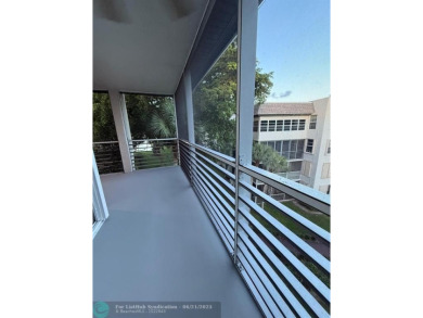 Experience the best of Pine Island Ridge in this spacious on Pine Island Ridge Country Club in Florida - for sale on GolfHomes.com, golf home, golf lot