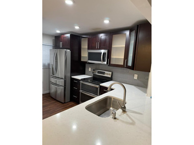 Experience the best of Pine Island Ridge in this spacious rarely on Pine Island Ridge Country Club in Florida - for sale on GolfHomes.com, golf home, golf lot