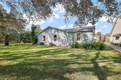 Feel Cozy in this CEDAR KEY model with BOND PAID situated in the on Mira Mesa Executive Golf Course in Florida - for sale on GolfHomes.com, golf home, golf lot