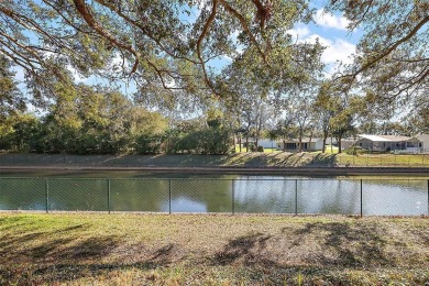 Feel Cozy in this CEDAR KEY model with BOND PAID situated in the on Mira Mesa Executive Golf Course in Florida - for sale on GolfHomes.com, golf home, golf lot