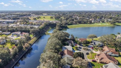 Feel Cozy in this CEDAR KEY model with BOND PAID situated in the on Mira Mesa Executive Golf Course in Florida - for sale on GolfHomes.com, golf home, golf lot