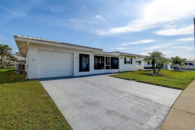 Welcome To This Charming 2 Bedroom 2 Bath Single-Family Home In on Mainlands Golf Club in Florida - for sale on GolfHomes.com, golf home, golf lot