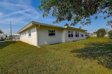 Welcome To This Charming 2 Bedroom 2 Bath Single-Family Home In on Mainlands Golf Club in Florida - for sale on GolfHomes.com, golf home, golf lot