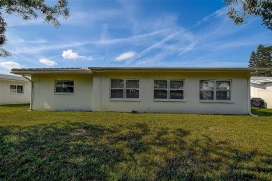Welcome To This Charming 2 Bedroom 2 Bath Single-Family Home In on Mainlands Golf Club in Florida - for sale on GolfHomes.com, golf home, golf lot