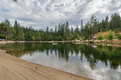 Have you ever seen a mountain cabin with a level driveway and a on Sequoia Woods Country Club in California - for sale on GolfHomes.com, golf home, golf lot
