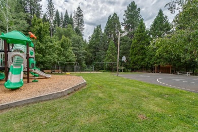 Have you ever seen a mountain cabin with a level driveway and a on Sequoia Woods Country Club in California - for sale on GolfHomes.com, golf home, golf lot