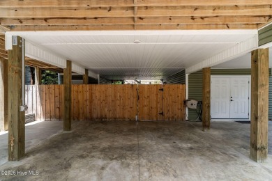 This pristine open floorplan beach home offers the ''new on Founders Club At St. James Plantation in North Carolina - for sale on GolfHomes.com, golf home, golf lot