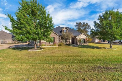 Discover golf course living in this stunning 2581 sq.ft. home on Pecan Plantation Country Club in Texas - for sale on GolfHomes.com, golf home, golf lot