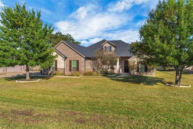 Discover golf course living in this stunning 2581 sq.ft. home on Pecan Plantation Country Club in Texas - for sale on GolfHomes.com, golf home, golf lot