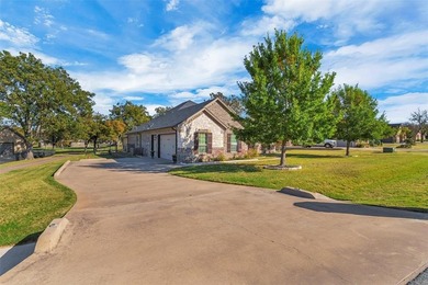 Discover golf course living in this stunning 2581 sq.ft. home on Pecan Plantation Country Club in Texas - for sale on GolfHomes.com, golf home, golf lot