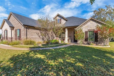 Discover golf course living in this stunning 2581 sq.ft. home on Pecan Plantation Country Club in Texas - for sale on GolfHomes.com, golf home, golf lot