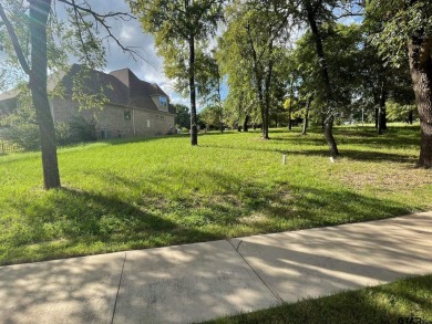 Perfect lot to build your low maintenance dream home on within on Eagles Bluff Golf Course in Texas - for sale on GolfHomes.com, golf home, golf lot