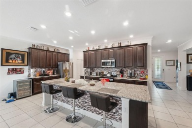 This exquisite 4-bedroom, 3-bathroom home in Oak Village of on Sugarmill Woods Golf and Country Club in Florida - for sale on GolfHomes.com, golf home, golf lot